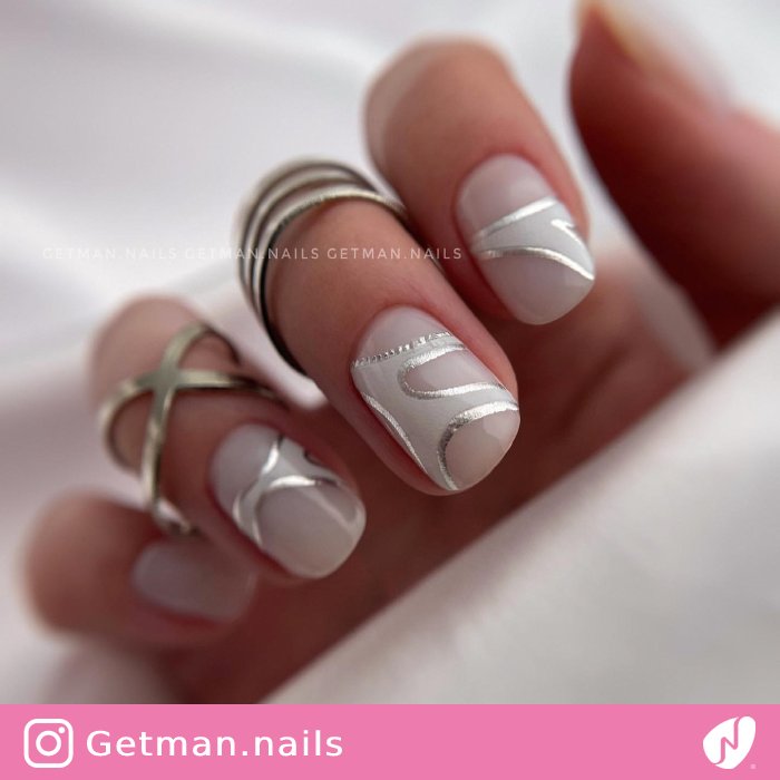 Abstract Swirls on Milky-based Nails